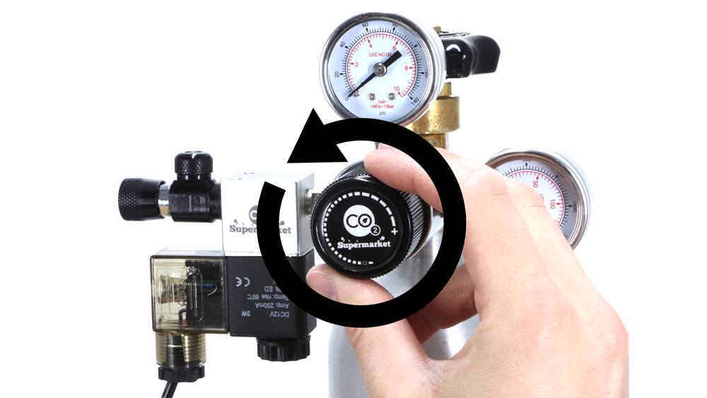 Set output pressure of dual stage regulator