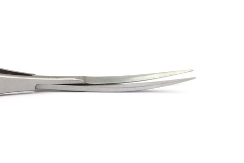 Clse-up photo of curved blades of spring scissors